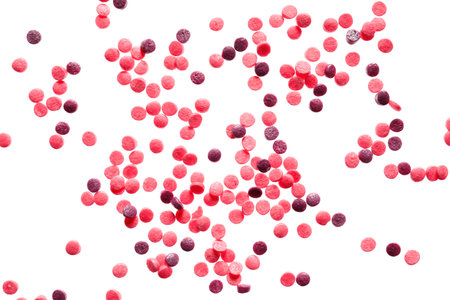 Sweet bright sprinkles on white background
