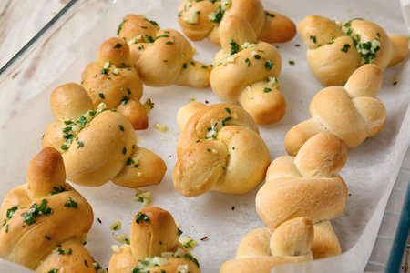 Baking sheet with tasty garlic buns, closeupの写真素材