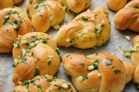 Baking sheet with tasty garlic buns, closeupの写真素材