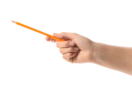 Female hand with color pencil on white backgroundの写真素材