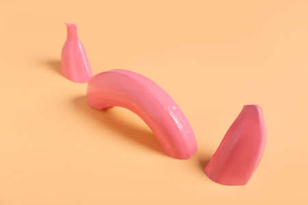 Creative composition with painted banana on color backgroundの写真素材