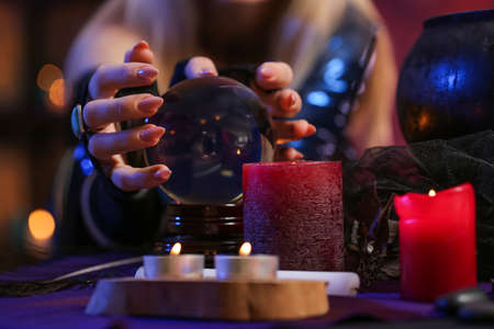 Fortune teller with crystal ball, closeupの写真素材