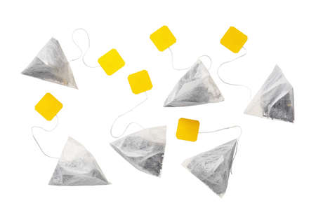 Tea bags on white background