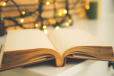 Book on table in room, closeup