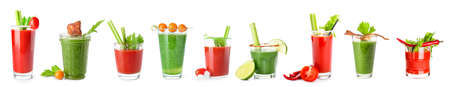 Glasses of different Bloody Mary cocktails on white backgroundの写真素材