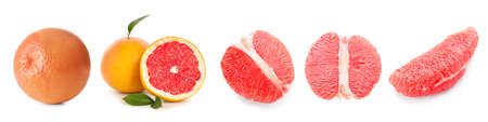 Fresh grapefruits with different pieces on white backgroundの写真素材