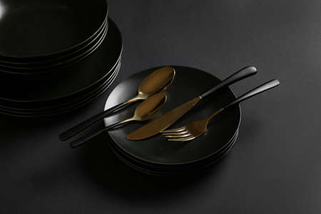 Stylish table setting on dark backgroundの写真素材