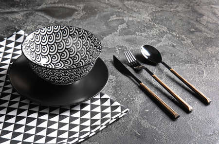 Stylish table setting on dark backgroundの写真素材