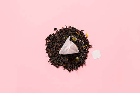 Composition with tea bag on color backgroundの写真素材