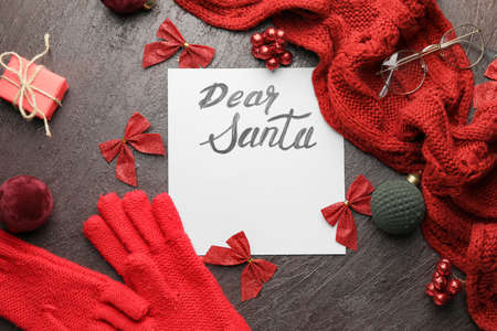 Blank letter to Santa and Christmas decor on dark backgroundの写真素材