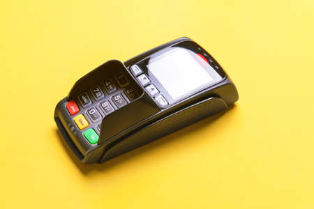 Payment terminal on color backgroundの写真素材