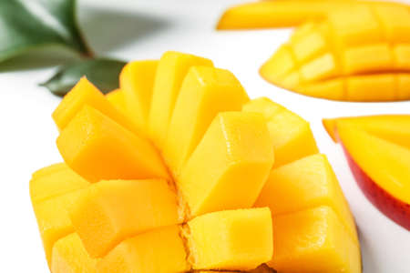 Sweet cut mango on white background, closeupの写真素材
