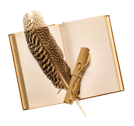 Old book with feather and scroll on white background