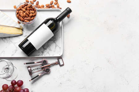 Composition with bottle of wine on grunge backgroundの写真素材