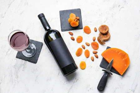 Composition with bottle of wine on grunge backgroundの写真素材