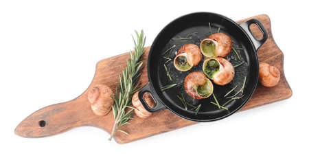 Frying pan with tasty snails on white backgroundの写真素材