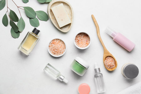 Set of bath supplies on light backgroundの写真素材