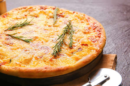 Tasty pizza on dark backgroundの写真素材