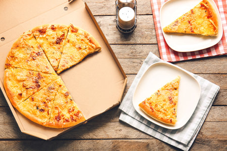 Tasty pizza on wooden backgroundの写真素材