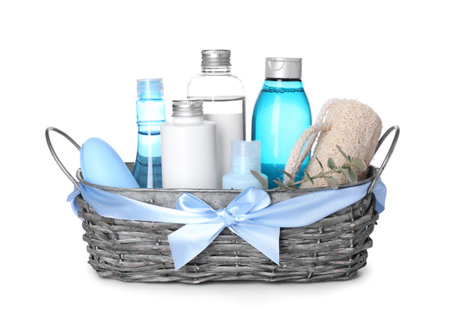 Gift basket with cosmetics and sponge on white backgroundの写真素材