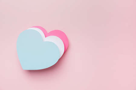 Paper hearts on color background. Concept of transgenderの写真素材