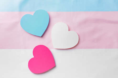 Paper hearts on flag of transgenderの写真素材