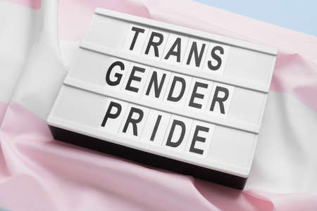 Board with text TRANS GENDER PRIDE on flagの写真素材