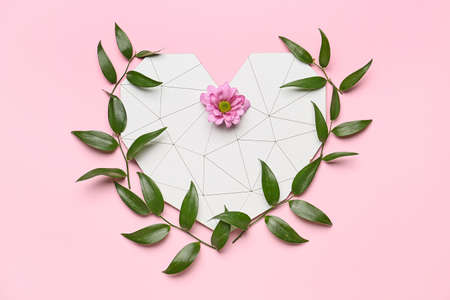 Romantic composition with floral decor on color backgroundの写真素材