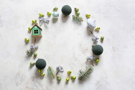 Frame made of beautiful Christmas decor on light backgroundの写真素材