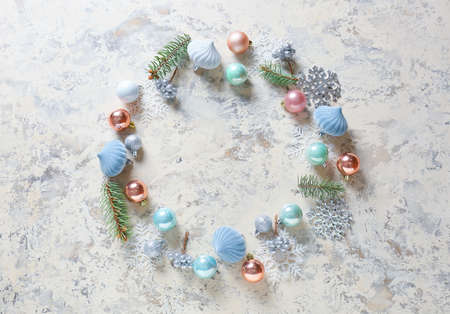 Frame made of beautiful Christmas decor on light background
