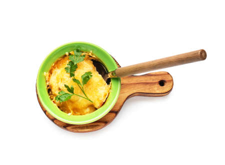 Ramekin with tasty julienne on white background