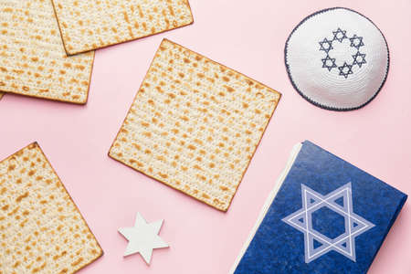 Composition with Jewish flatbread matza for Passover on color backgroundの写真素材