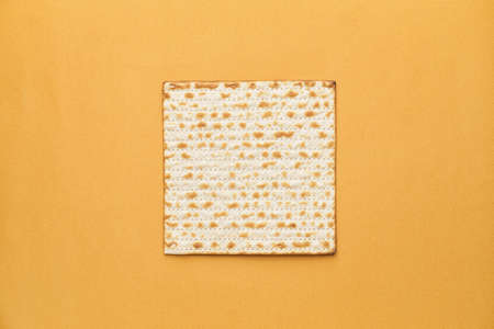 Jewish flatbread matza for Passover on color backgroundの写真素材