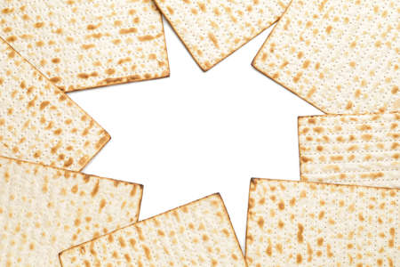 Jewish flatbread matza for Passover on white backgroundの写真素材
