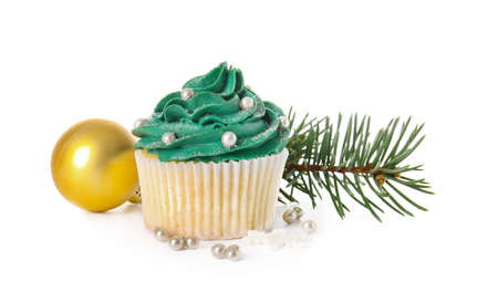 Tasty Christmas cupcake on white backgroundの写真素材