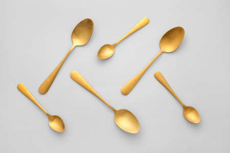 Clean spoons on gray backgroundの写真素材