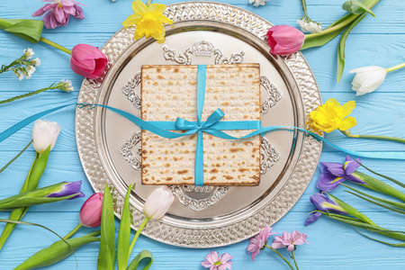Festive composition for Passover celebration on color wooden backgroundの写真素材