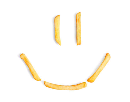 Funny composition with tasty french fries on white backgroundの写真素材