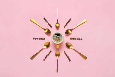 Composition with cup of coffee, spoons and coffee beans on color background