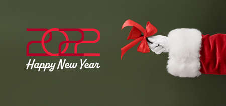 Beautiful greeting card for Happy New Year 2022 celebration with Santa Claus holding bell
