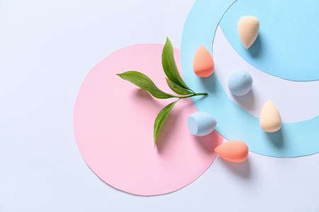 Composition with makeup sponges on white backgroundの写真素材