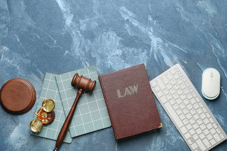 Composition with judge's gavel on color backgroundの写真素材