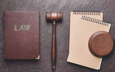Composition with judge's gavel on color background