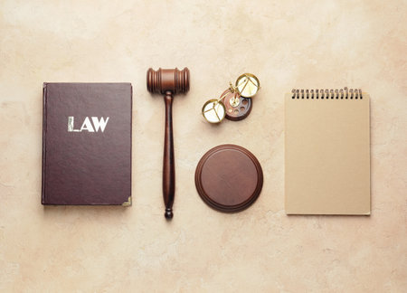 Composition with judge's gavel on color backgroundの写真素材