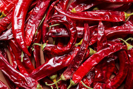 Hot dry chili pepper as background