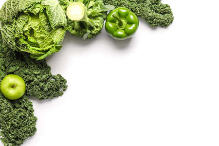 Fresh green vegetables on white backgroundの写真素材