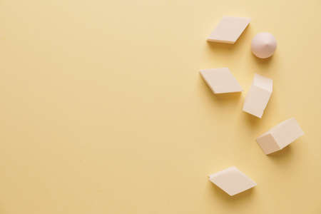 Makeup sponges on color background