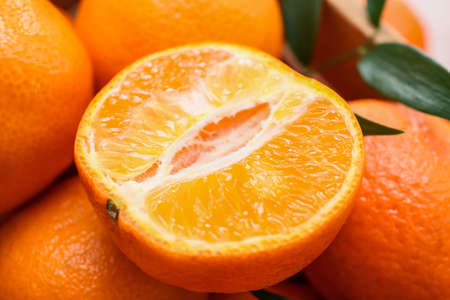 Many sweet juicy tangerines, closeup