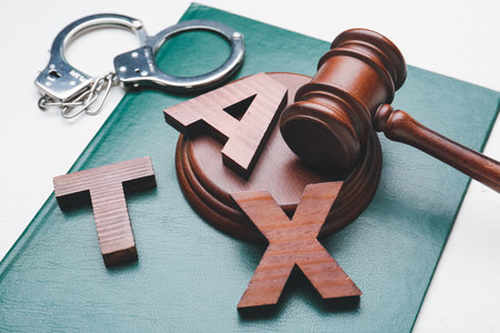 Word TAX with judge's gavel and book on white backgroundの写真素材