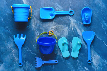Set of beach accessories for children on color backgroundの写真素材